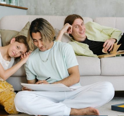 A family enjoying quality time in a comfortable living room setting.