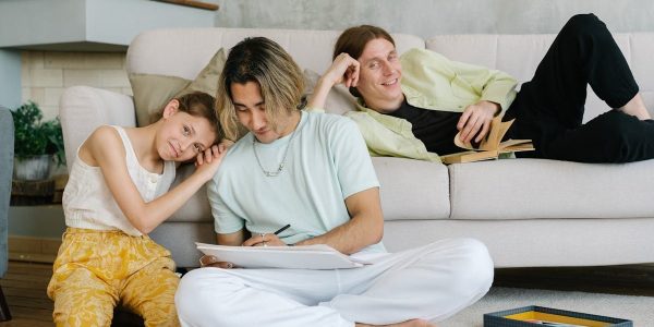 A family enjoying quality time in a comfortable living room setting.